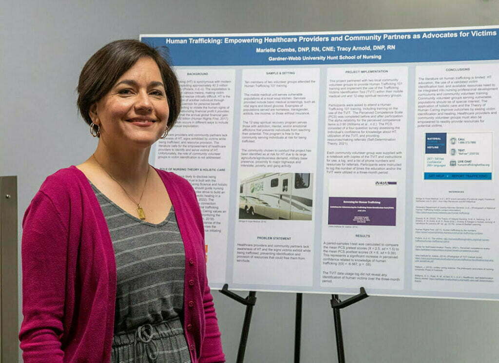 Advisory Board Member Marielle Combs DNP, RN, CNE and the poster describing her work