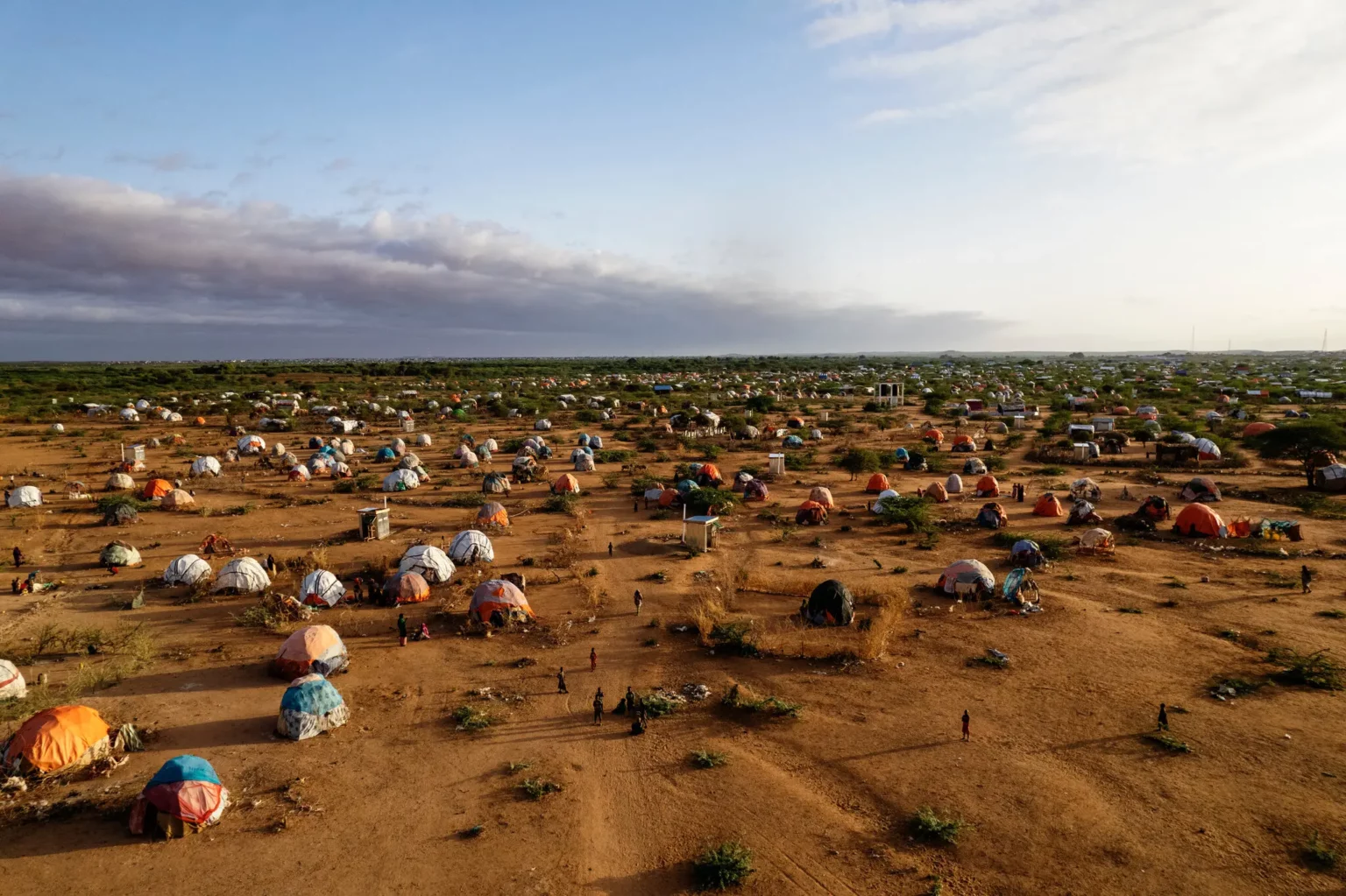 The Qansahley camp this past May in in Doolow, in the southern Gedo region of Somalia. Displaced Somalis, uprooted by drought and suffering from food shortages, live at the camp.Credit...Malin Fezehai for The New York Times