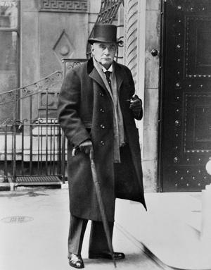 FILE - J.P. Morgan, noted financier, who is rarely photographed, is pictured arriving at his office in London, Oct. 1932. (AP Photo, File)