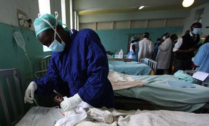 A doctor carrying out tests at the Kenyatta National Hospital.