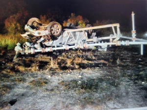 The truck came to a stop upside down off the roadway. Texas Department of Public Safety