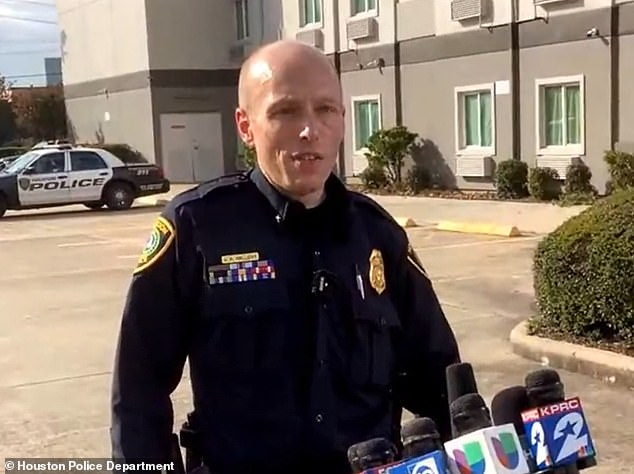 Houston Police Department officer Jonathan Halliday speaking to the press outside the Motel 6 where the victims were found
