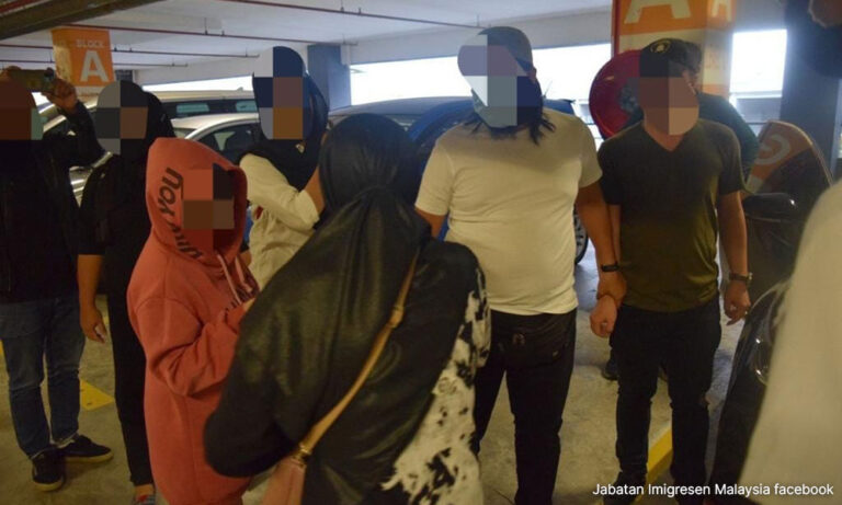 Human trafficking syndicate busted at KLIA2, two immigration officers held