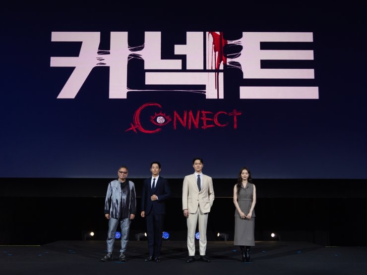 From left, director Takashi Miike and actors Jung Hae-in, Ko Kyung-pyo and Kim Hye-jun pose during a press conference for Disney+'s upcoming Korean crime thriller original series, 'Connect,' at the Disney Content Showcase in Singapore. Courtesy of Walt Disney Company 