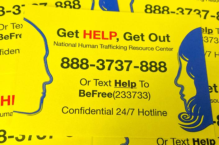 A sign displaying resources for those in a human trafficking situation to receive help. The signs are displayed in United Supermarket's bathrooms.