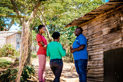2022_South Africa_Male monitor talking to two females in the village about human trafficking_CS (2)