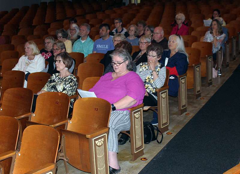 Audience members listen to a lecture on human trafficking Wednesday night in Victoria. Photo by Cristina Janney/Hays Post